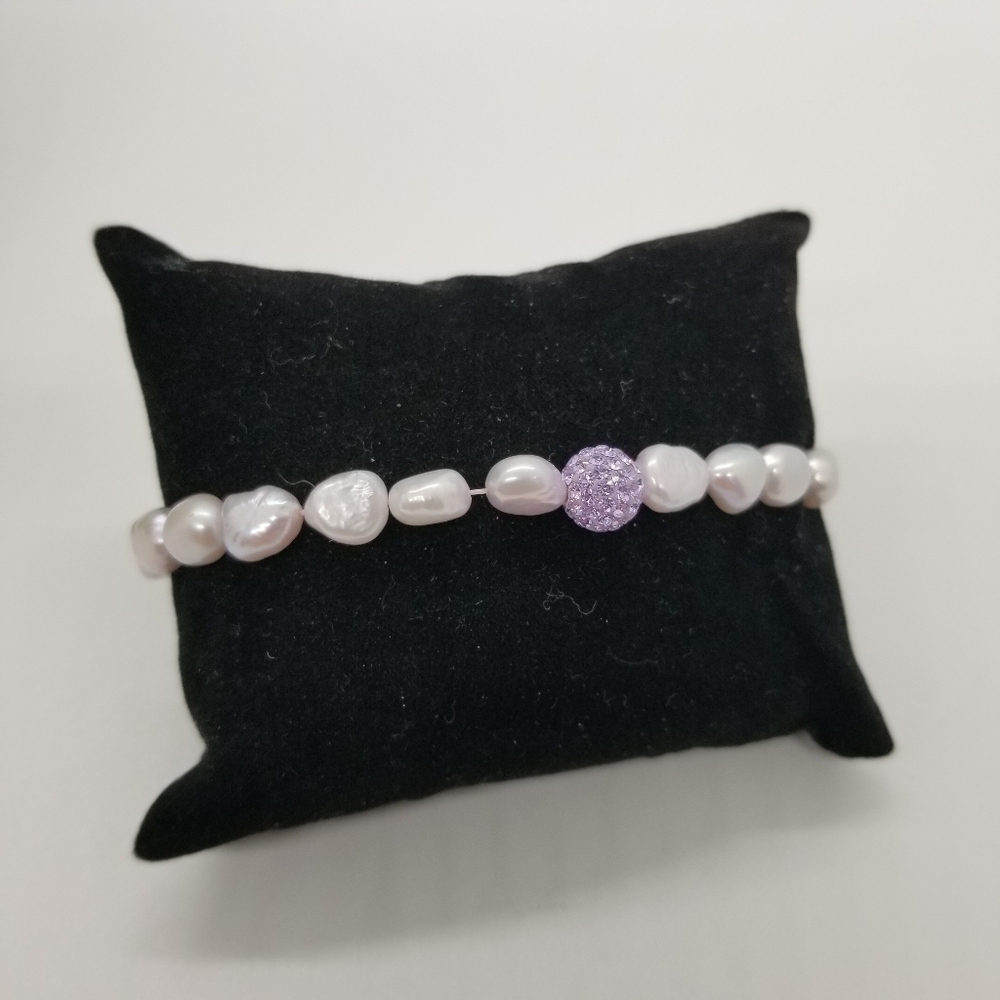 stretch pearl bracelet with purple sparkly ball bead